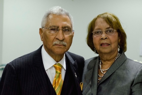 man-standing-with-wife
