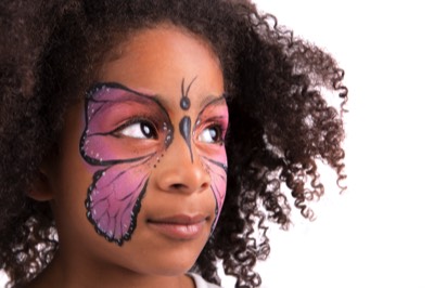 smiling-girl-with-butterfly-face-paint