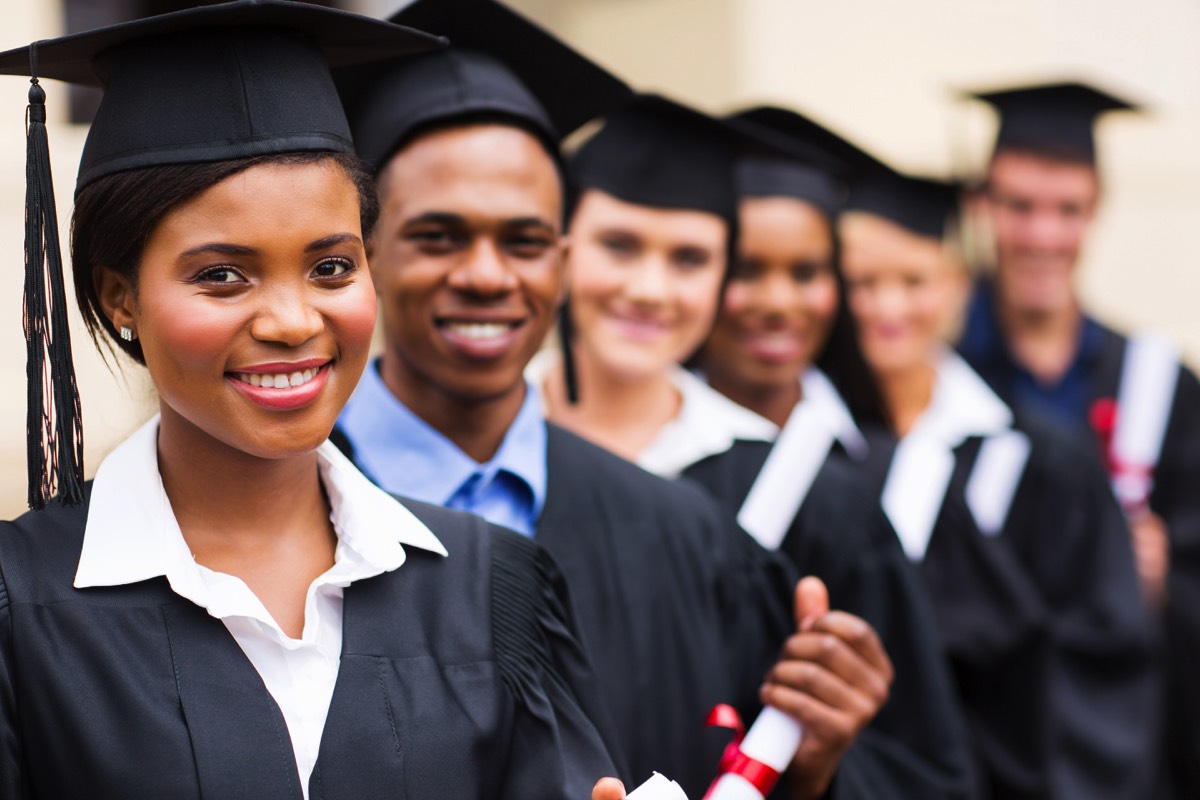 smiling-college-graduates-standing